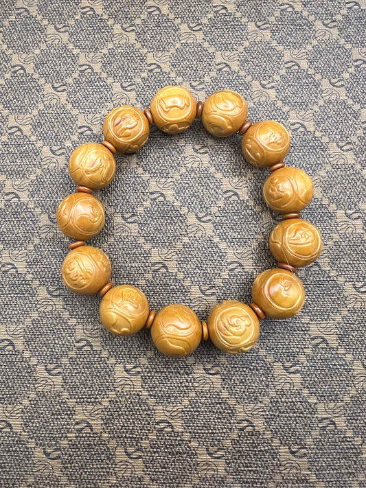 Olive Pit Carving - Faceless Buddha on Round Beads